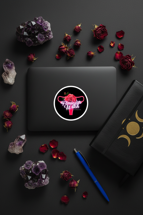 Feminist Witch sticker lifestyle flat lay photo