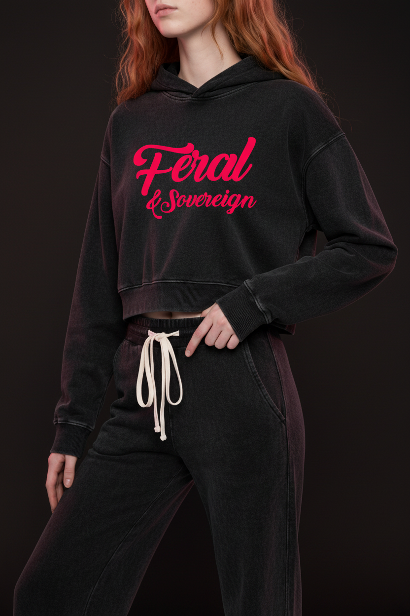 Model wearing Feral & Sovereign Cropped Hoodie in black vintage wash